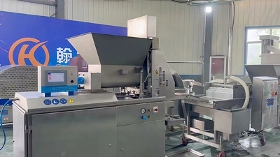 Línea automática de formado, rebozado y empanado de carne